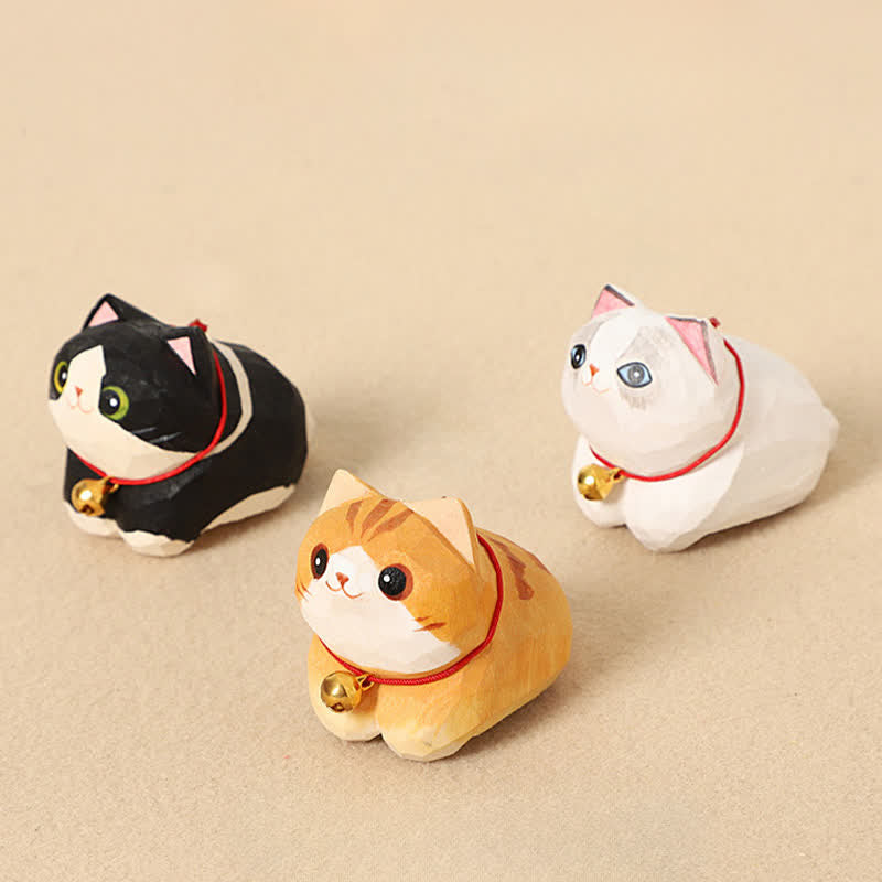 Wood Cat Keychain – Three hand-carved cat figurines in black, orange, and white, collectible wood set