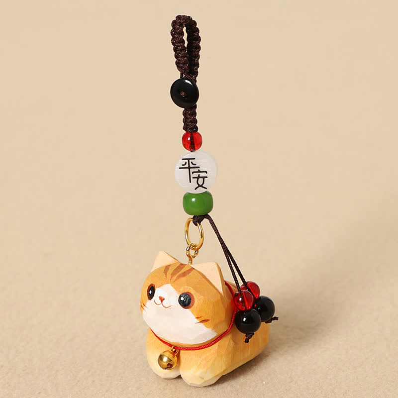 Hand-Carved Wood Lying Cat Om Mani Padme Hum Keychain Secondary image