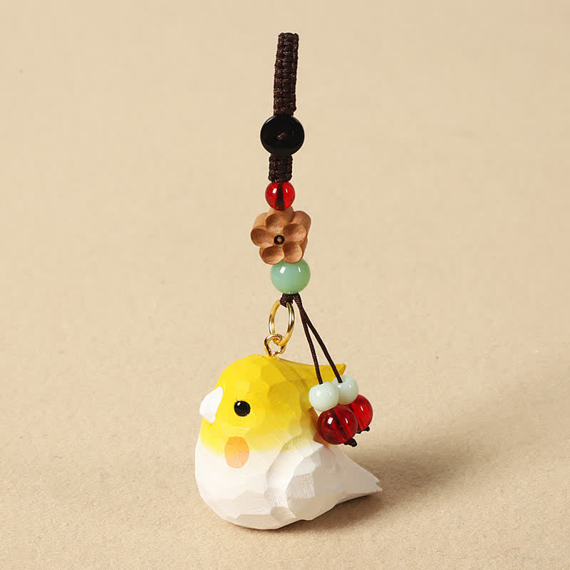 Hand-Carved Wood Cockatiel Om Mani Padme Hum Keychain Secondary image
