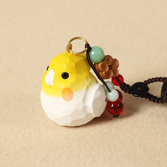 Hand-Carved Wood Cockatiel Om Mani Padm… – Carved cockatiel charm with gold ring connector and mint green beaded strand, art…