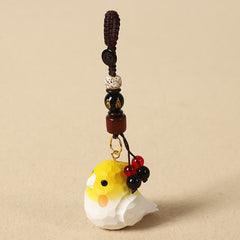 Hand-Carved Wood Cockatiel Om Mani Padm… – Hand-carved yellow cockatiel with braided cord and beaded tassel, wooden bird key…
