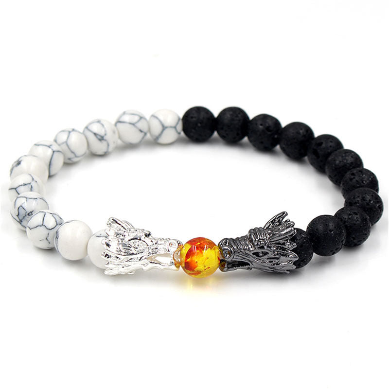 White Turquoise Lava Rock Dragon Bracelet – Top-down view of white howlite black lava dual-tone beaded band, Calm