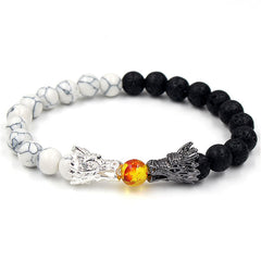 White Turquoise Lava Rock Dragon Bracelet – Top-down view of white howlite black lava dual-tone beaded band, Calm
