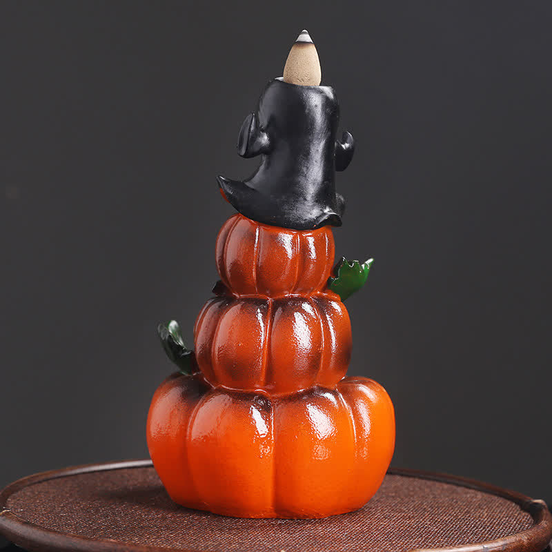 Pumpkin stack backflow burner with black witch hat and unlit cone, green leaves, brown platform – Halloween incense burner