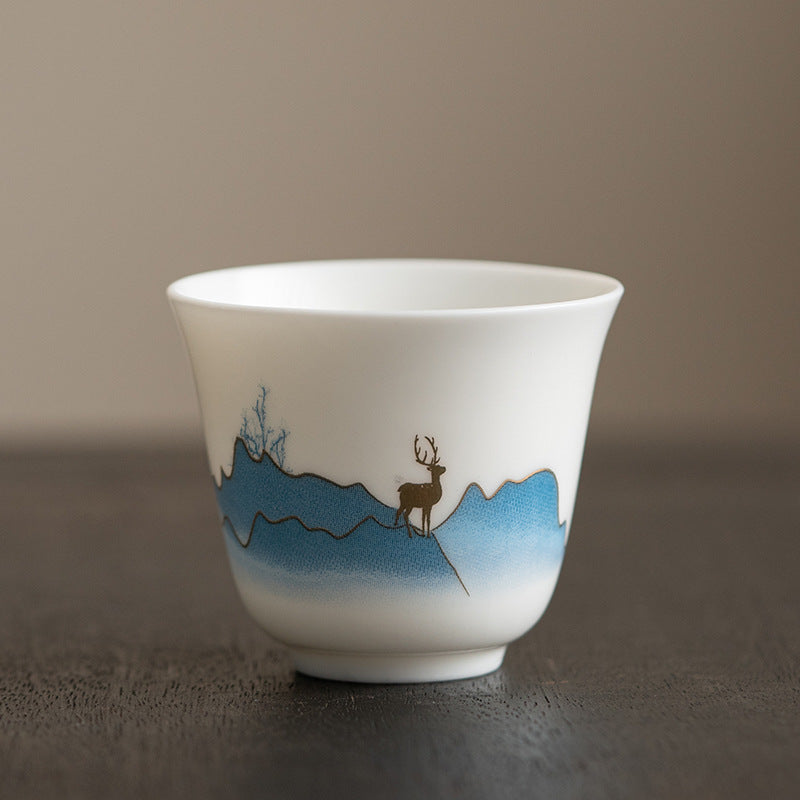 Ceramic Kung Fu Tea Cup – pink peony in cobalt blue ruyi cartouche with gold scrollwork, vibrant, auspicious