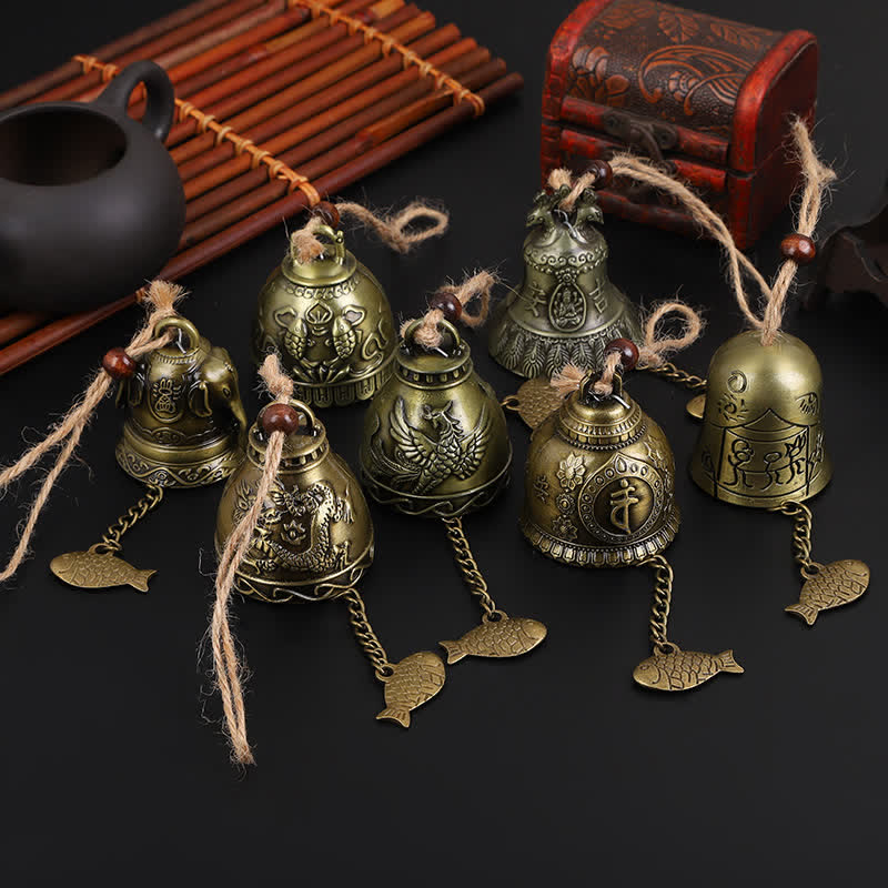 Feng Shui Wind Chime Bell - 7 bronze bells with dragon, phoenix and Buddha motifs on black, spiritual decor