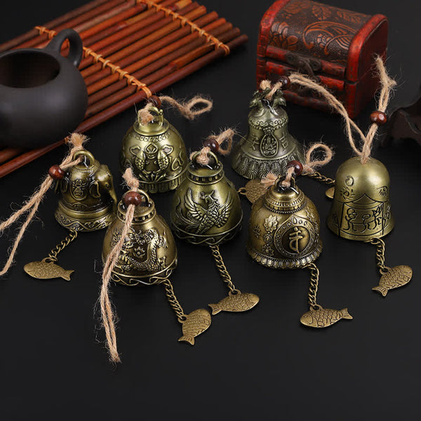 Feng Shui Wind Chime Bell - 7 bronze bells with dragon, phoenix and Buddha motifs on black, spiritual decor