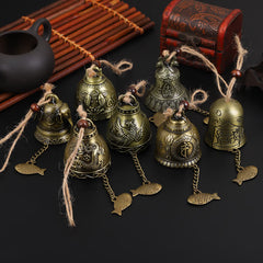 Feng Shui Wind Chime Bell - 7 bronze bells with dragon, phoenix and Buddha motifs on black, spiritual decor