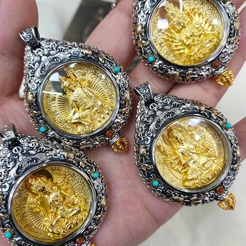 Zodiac Buddha Thangka Wealth Rotatable Pendant – macro detail of silver border relief with turquoise and coral inlays, craft
