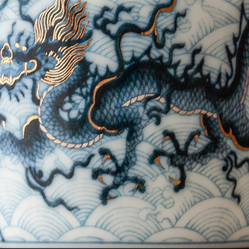 Blue & White Dragon Ceramic Teacup – macro dragon body with wave pattern, gold gilding, porcelain art