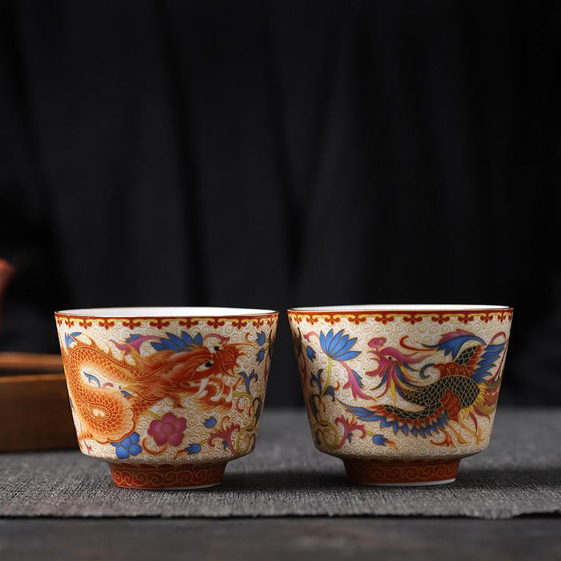 2Pcs Dragon Phoenix Ceramic Teacup Set - Dragon phoenix pair on gray fabric, ceremonial tea