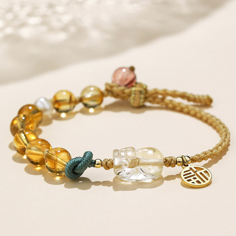 Citrine PiXiu Fu Bracelet – Side view citrine bracelet with PiXiu, teal knot detail