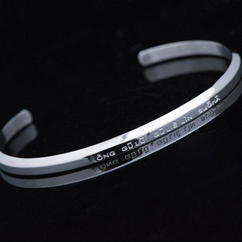Om Mani Padme Hum Engraved Bracelet – silver cuff side view with polished finish, engraved bangle