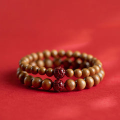 Peach Wood & Cinnabar Lotus Bracelet triple-strand stack on red, carved red lotus center beads, bohemian stacking bracelet
