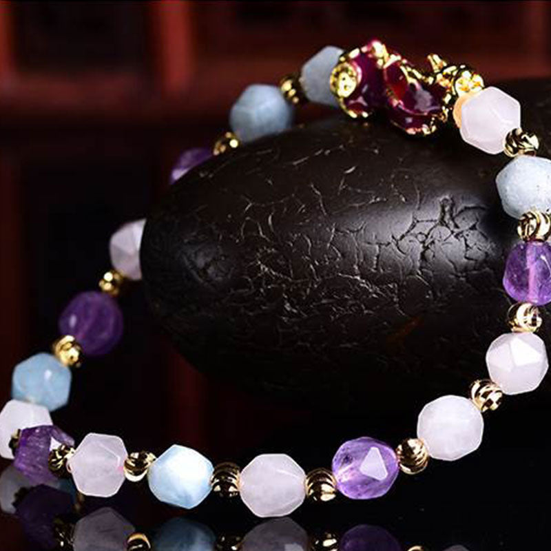Natural Amethyst Pixiu Bracelet – alternate angle on black stone, purple and white crystal beads with gold pixiu