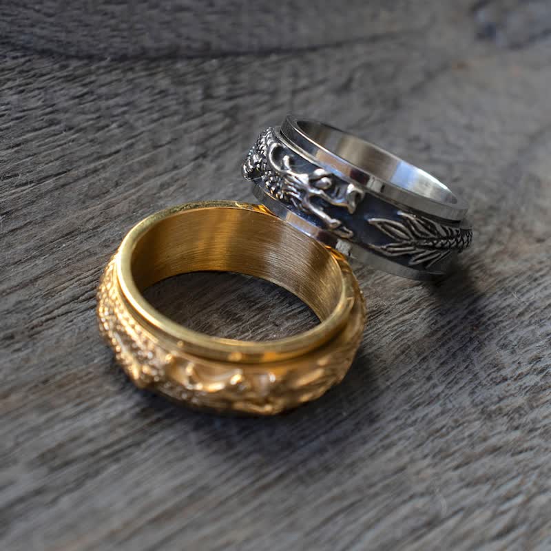 Dragon Titanium Steel Ring – Gold and silver spinners on weathered wood, calm