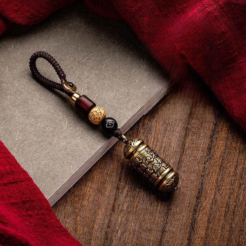 Tibetan Om Mani Padme Hum Brass Car Ornament, side view