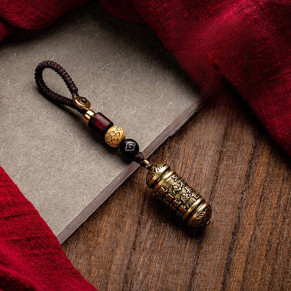 Tibetan Om Mani Padme Hum Brass Car Ornament, side view