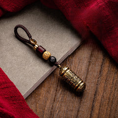Tibetan Om Mani Padme Hum Brass Car Ornament, side view