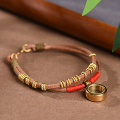 Gau Box Bracelet – brown leather double strand with gold rings and red cord on suede, Tibetan protection jewelry