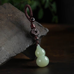 Jade Gourd Sandalwood Car Keychain, side view, lucky charm