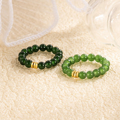 Jade Bead Ring – two rings dark and light green jade with gold details, cream lace and glass decor, sterling silver feng shui set