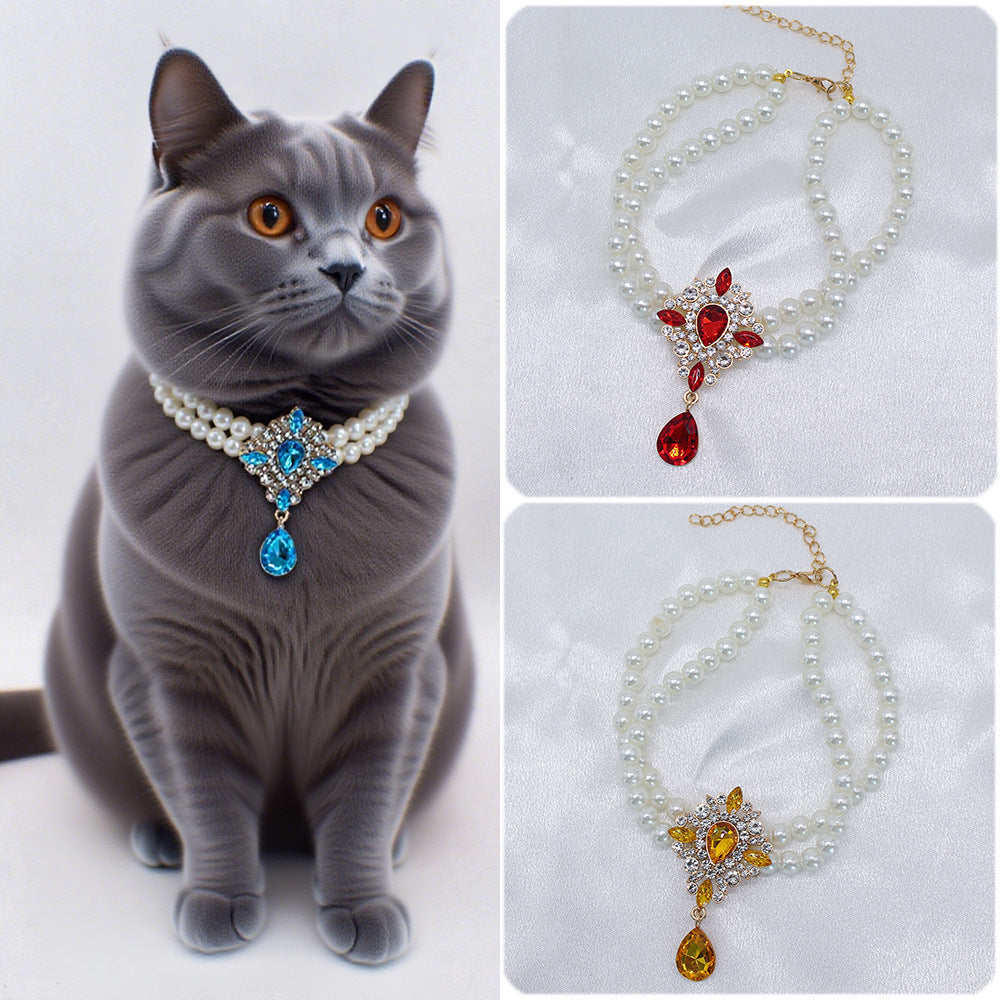 Elegant Pearl Crystal Collar – Gray cat wearing blue crystal pearl collar with red and yellow variants