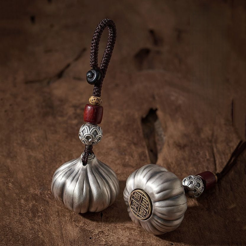 Thai Silver Garlic Protection Charm – Keychain, angled view, pendant necklace