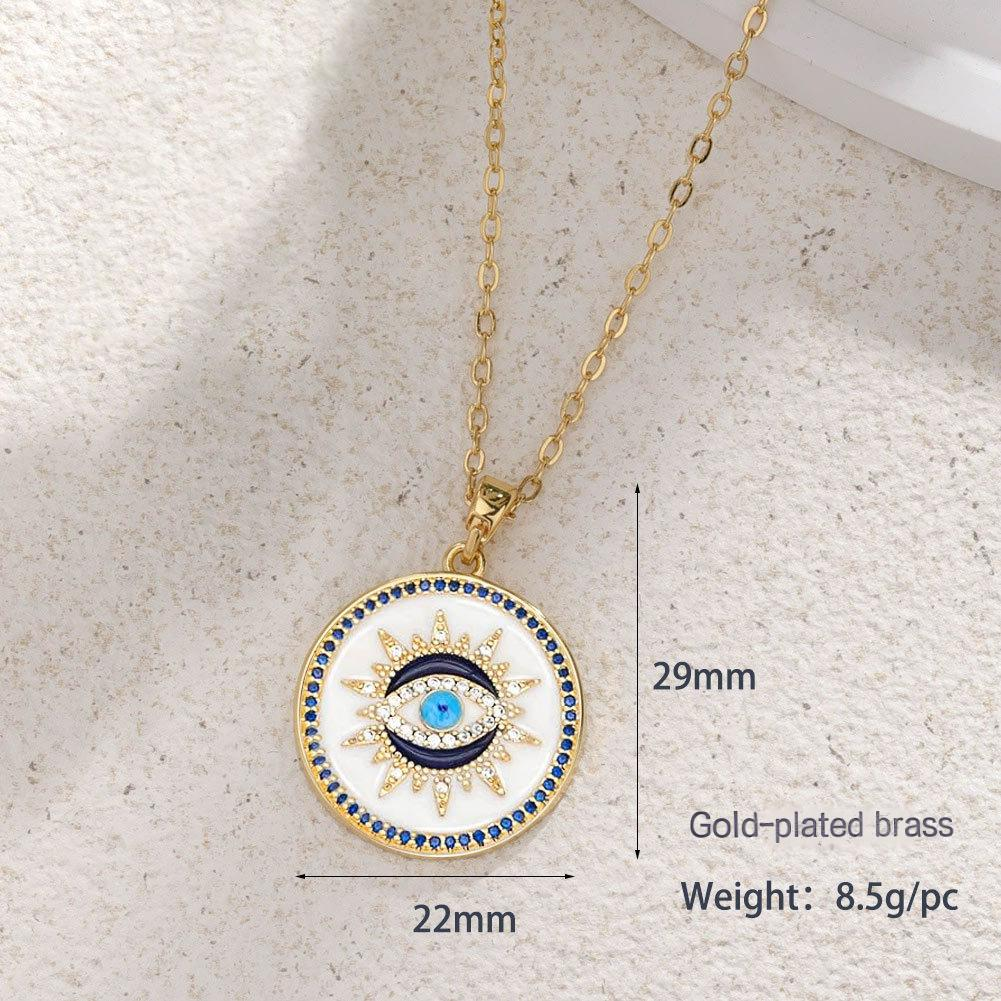 Gold Enamel Sunburst Evil Eye Necklace | White Disc, Blue CZ