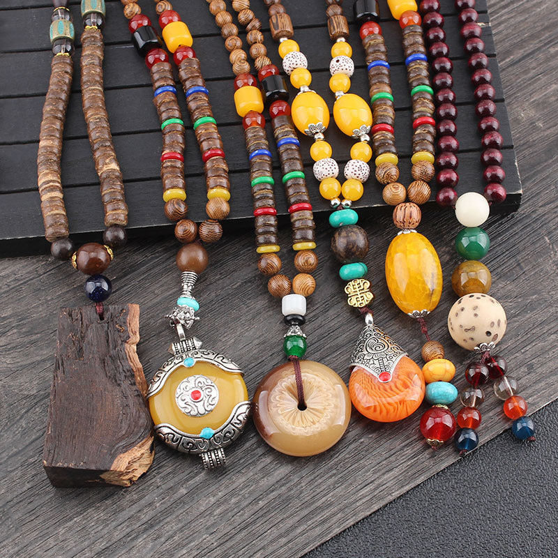 Wenge Mala Collection – multiple mala necklaces with various pendants displayed together, meditation jewelry set