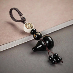 Black Obsidian Hulu Gourd Keychain, close-up detail, lucky charm