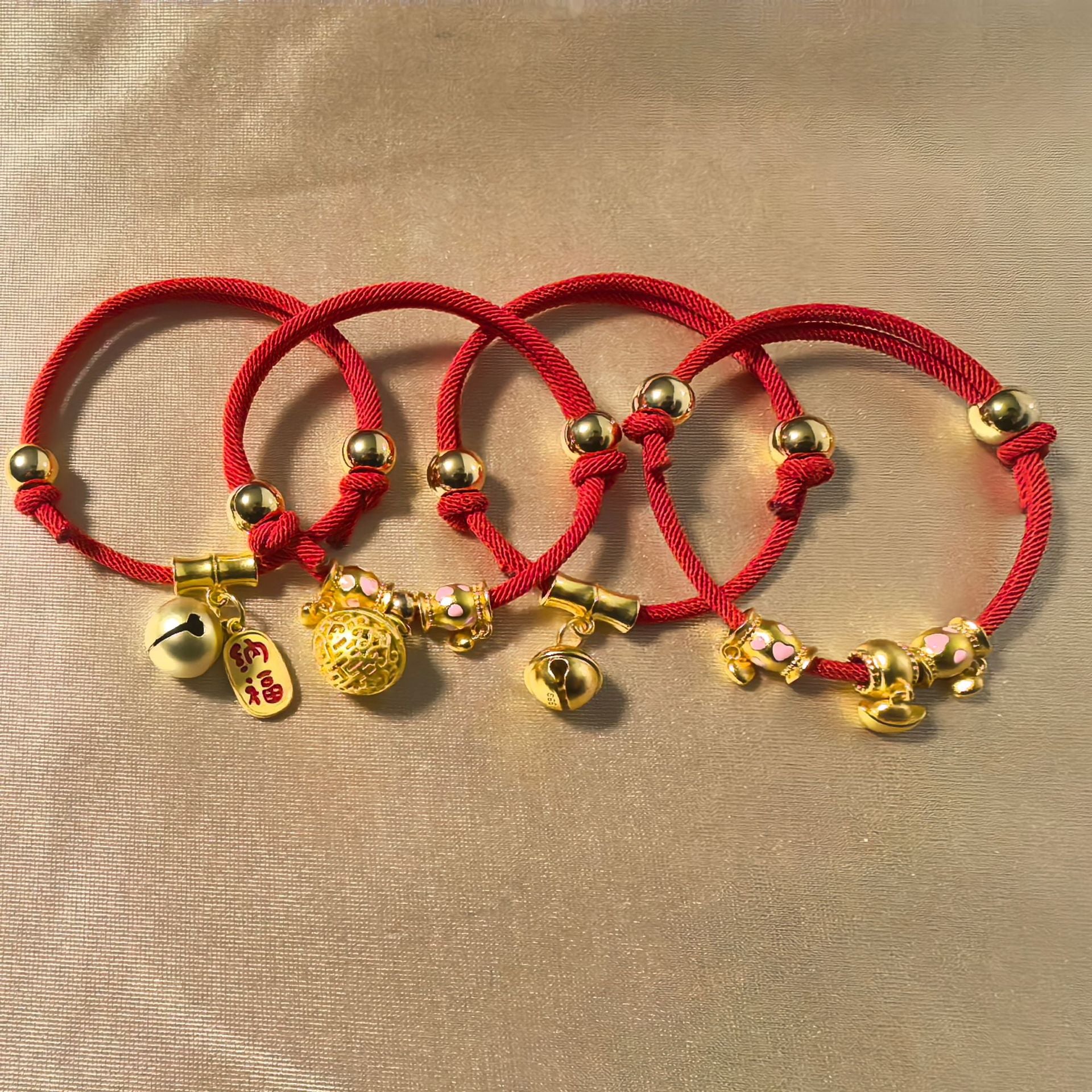 Feng Shui Bell Collar - Four red cord variants with bells yuanbao and Na Fu charms, adjustable lucky pet collar set