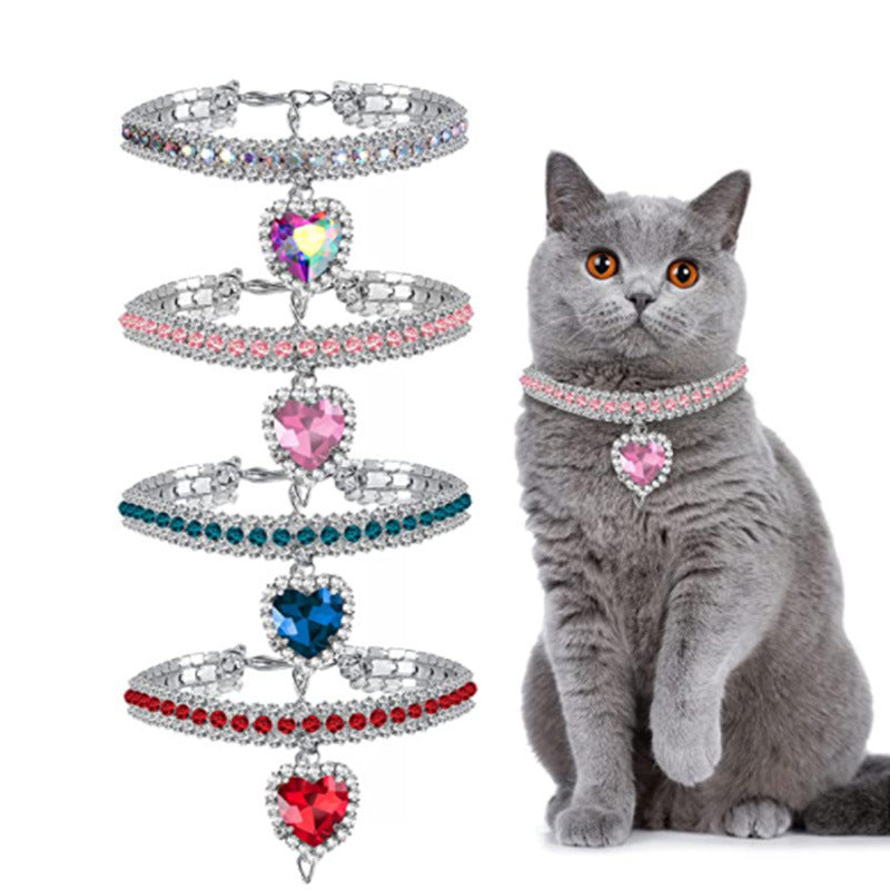 Heart Crystal Pet Collar – four color variants iridescent pink teal red, British Shorthair cat model, white