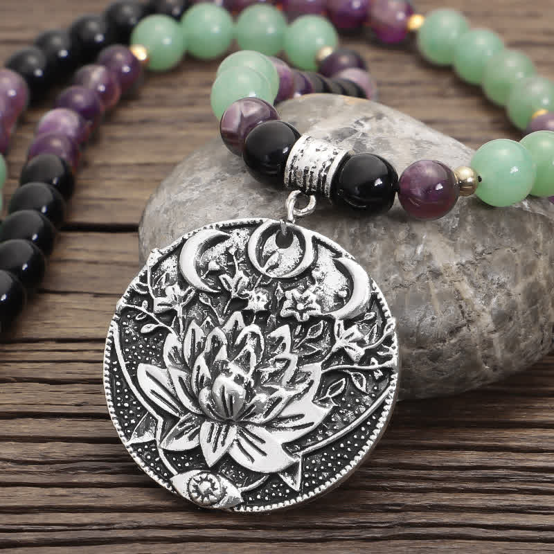 Amethyst Aventurine Lotus Mala - Necklace with lotus flower medallion on gray river stone, artisan mala