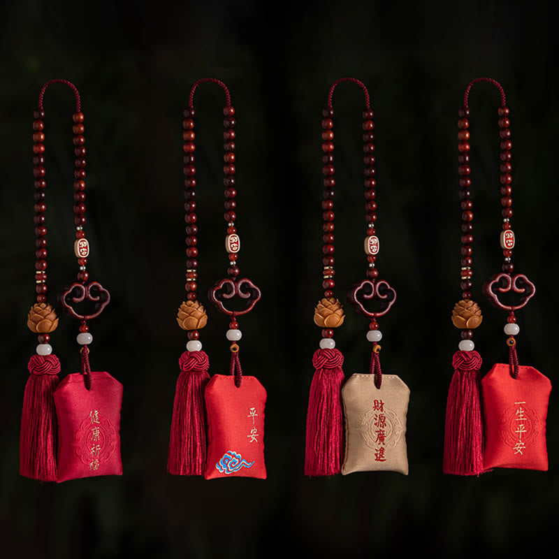 Red Sandalwood Car Hanging - Four variant charms on black background with blessing pouches and tassels, car ornament set