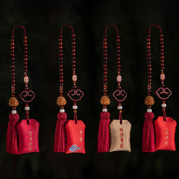 Red Sandalwood Car Hanging - Four variant charms on black background with blessing pouches and tassels, car ornament set