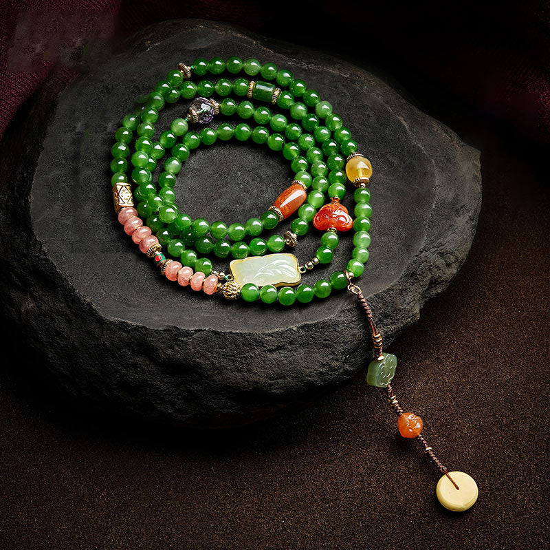 108 Mala Beads Jade Agate Bracelet – Cyan jade bead color and translucency close-up, fine stone
