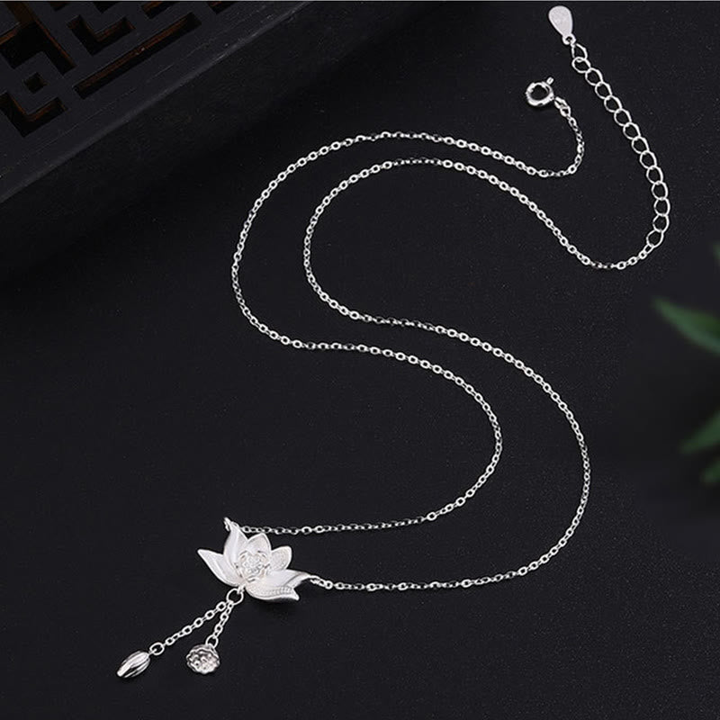 999 Silver Lotus Pod Necklace – Serpentine chain with lotus pendant, carved wood screen, silver lotus jewelry