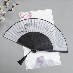 Plum Blossom Ink Fan – Black fan with ink wash plum blossoms on white paper, Chinese folding fan