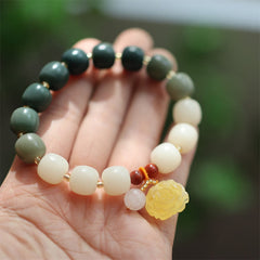 Gradient Bodhi Seed Amber Lotus Bracelet – barrel beads in forest green to ivory gradient, Mindful
