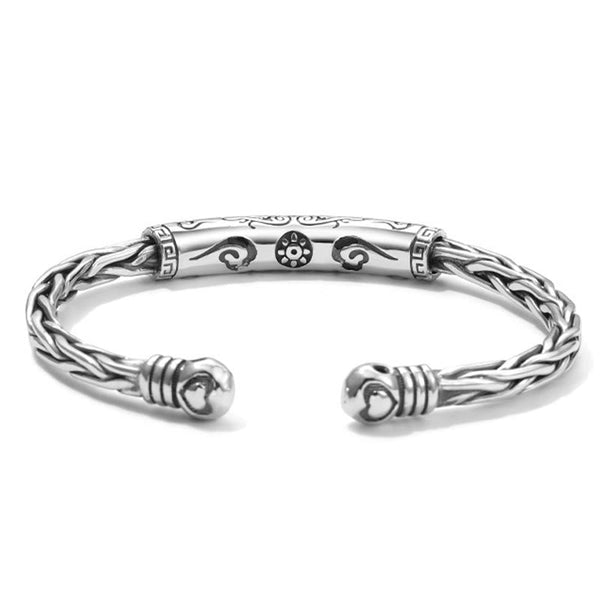 Tibetan Om Mani Padme Hum Engraved Copper Cuff Bangle – Top-down view revealing engraved sun motif and scrollwork, copper bangle