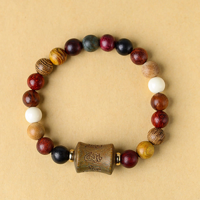Multicolored Sandalwood Prayer Bracelet – Overhead flat lay view, full circular bead arrangement