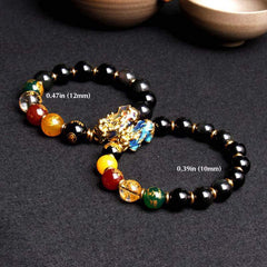 Color-Changing PiXiu Obsidian Five Elements Bracelet – two sizes 10mm and 12mm comparison on dark background, crystal bracelet