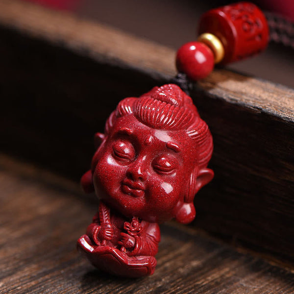 Chinese Zodiac Cinnabar Pendant – Intricate Buddha carving in meditation mudra on dark wood, amulet jewelry