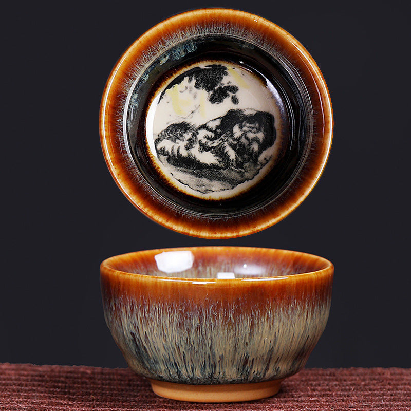 12 Zodiac Jian Zhan Teacup - all twelve zodiac animals visible in overhead view on wooden display stand, complete collection