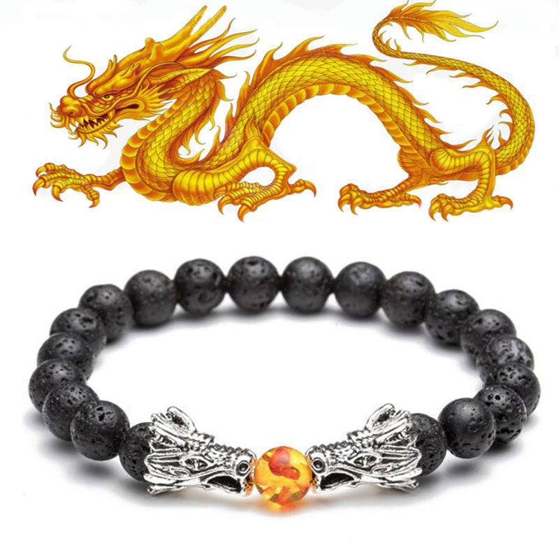 White Turquoise Lava Rock Dragon Bracelet – Black lava beads silver dragons amber center elevated angle, Protective
