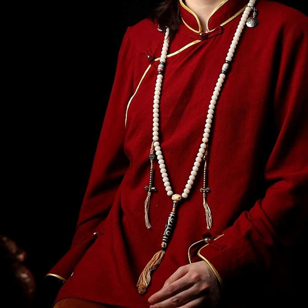 108 Mala Beads Bracelet – Full length on model, tassels and metal accents