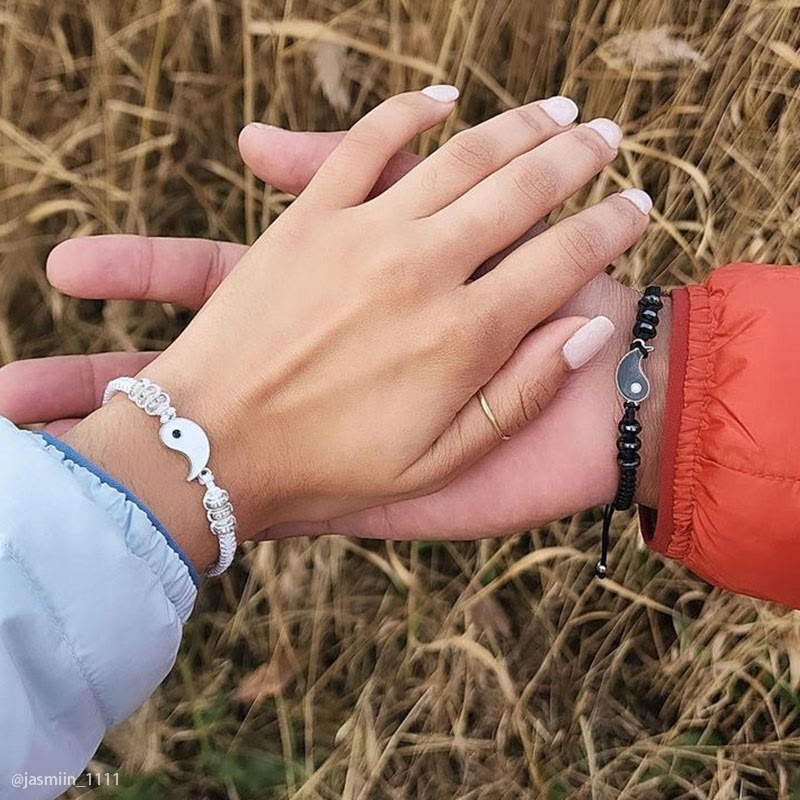 Yin Yang Hematite Bracelet - Couple holding hands wearing matching yin-yang bracelets, his & hers gift