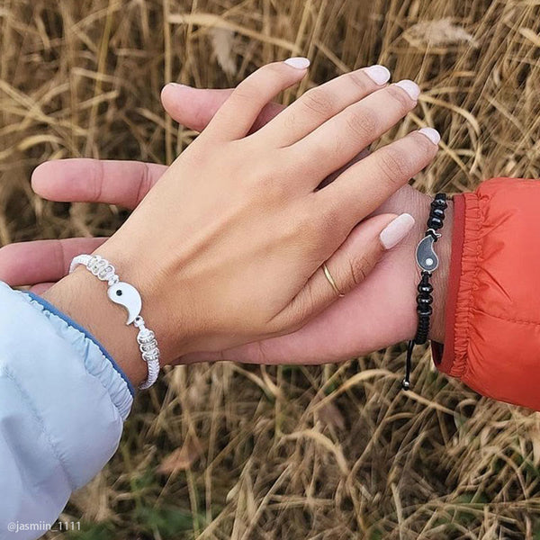 Yin Yang Hematite Bracelet - Couple holding hands wearing matching yin-yang bracelets, his & hers gift