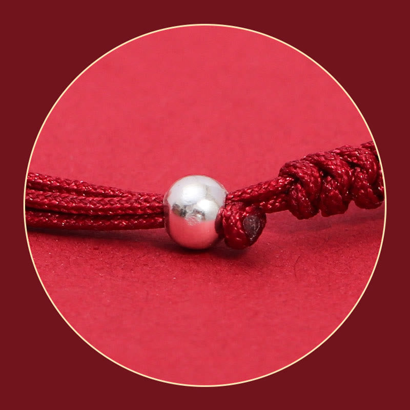 Silver PiXiu Strawberry Quartz Bracelet – Close-up silver bead and red braided cord detail